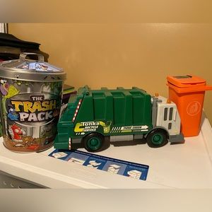 Garbage truck and trash cans